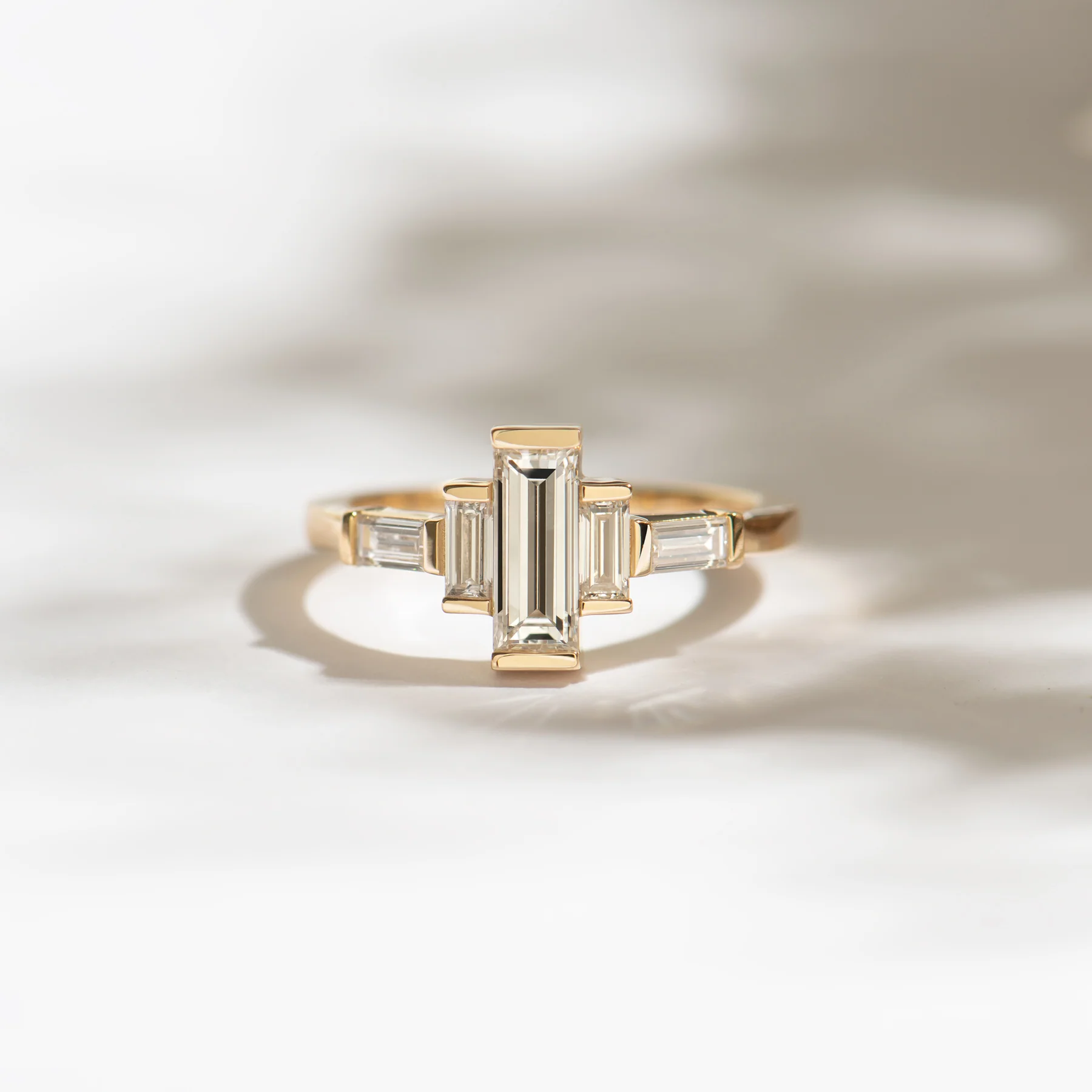 Baguette Diamond Engagement Ring with Golden Framework - Image 4