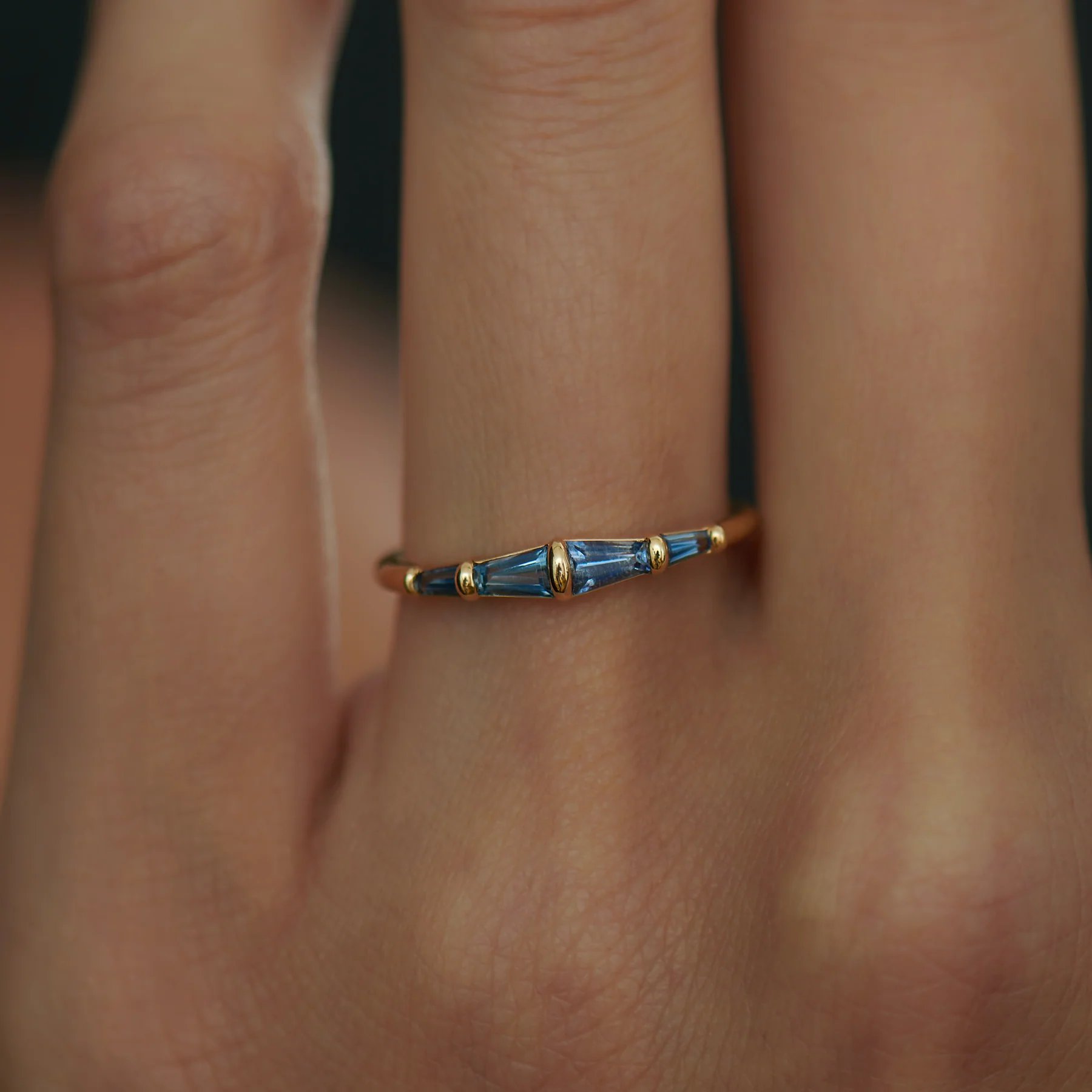 Blue Sapphire Tapered Baguette Gold Bar Ring - Image 4