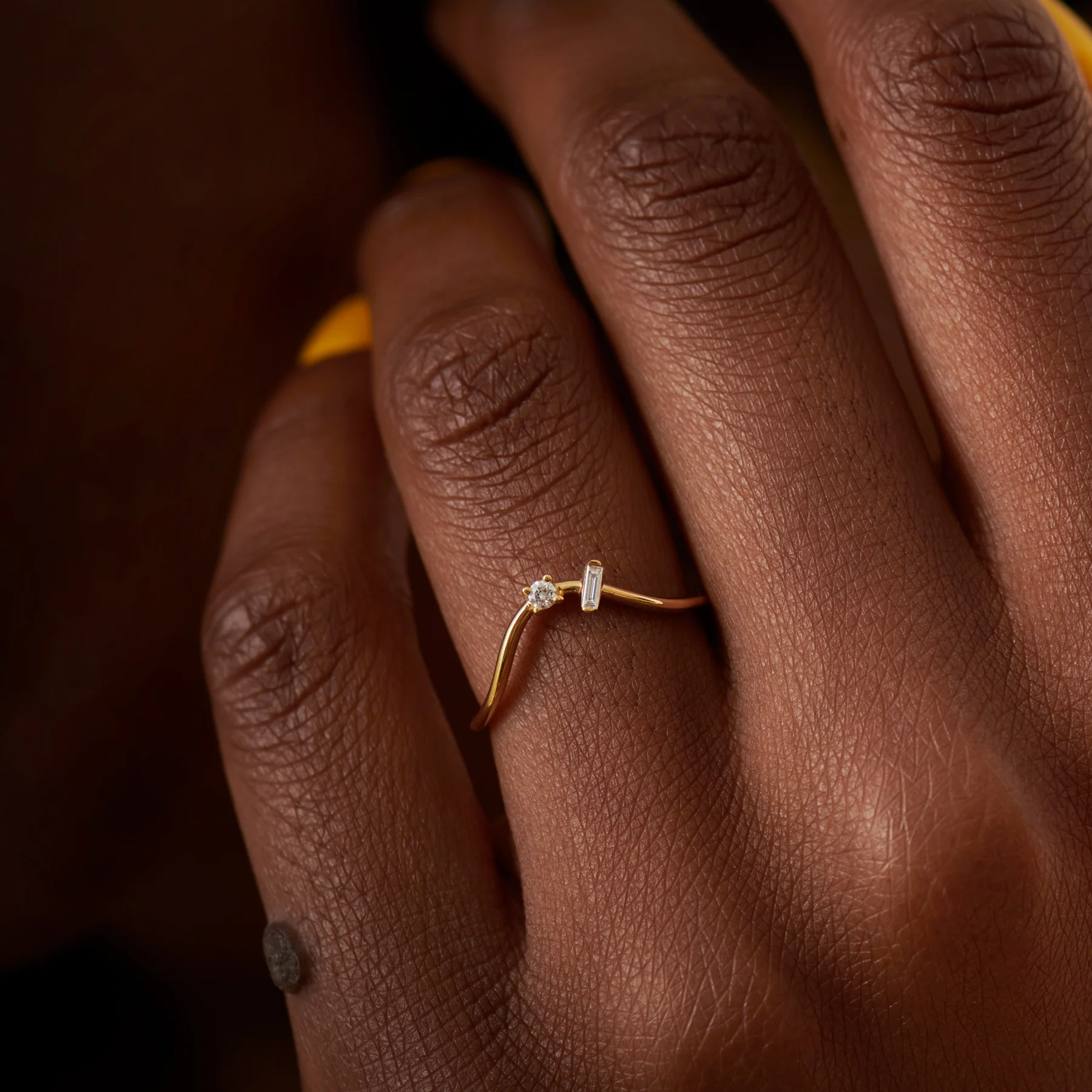 Curved Wedding Band Embellished with a Baguette and a Brilliant Diamond - Image 2