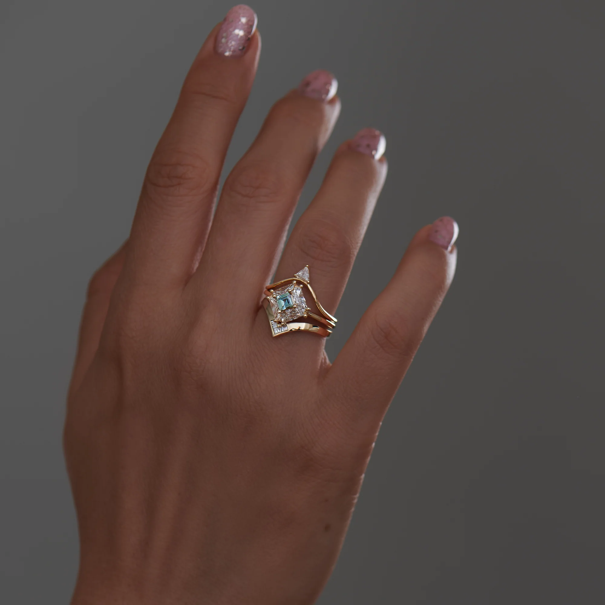 Curved Wedding Band with a Triangle Diamond Peak - Image 8
