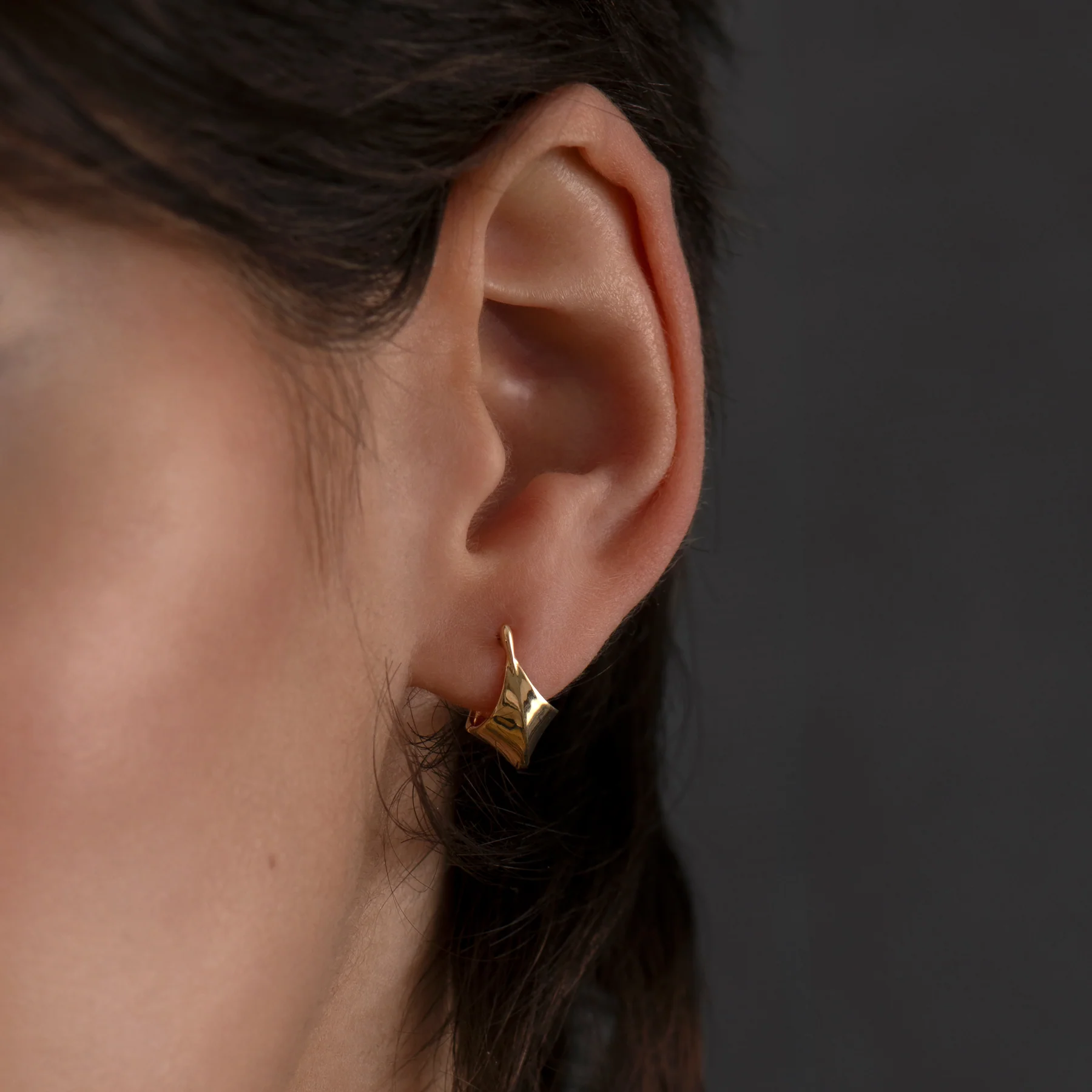 Gold Edgy Huggie Earrings - Image 4