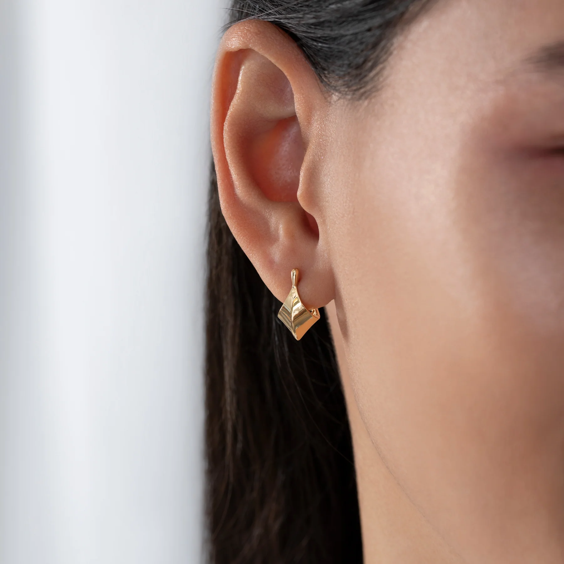 Gold Edgy Huggie Earrings - Image 5