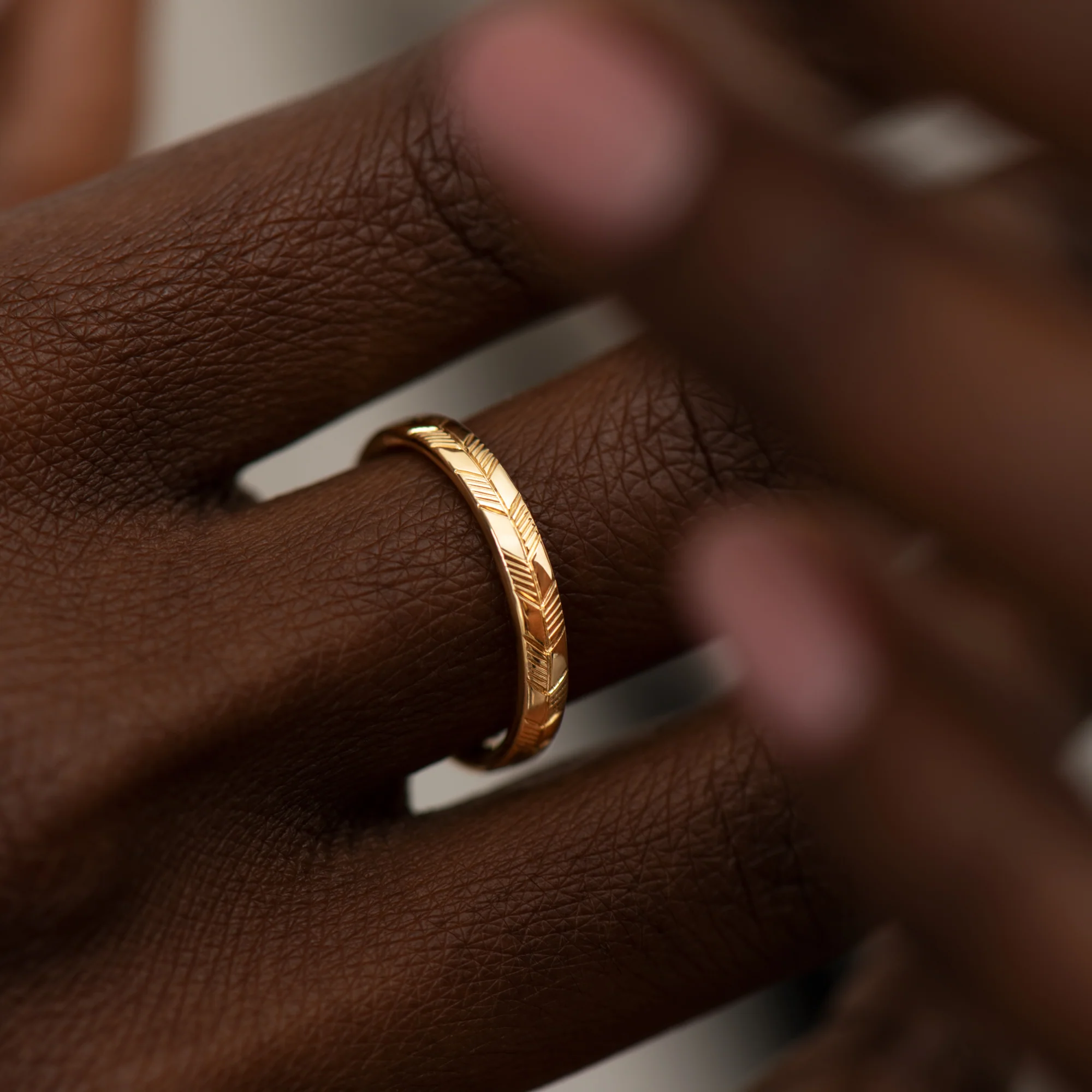 Golden Wedding Band with an Abstract Feather Engraving - Image 6