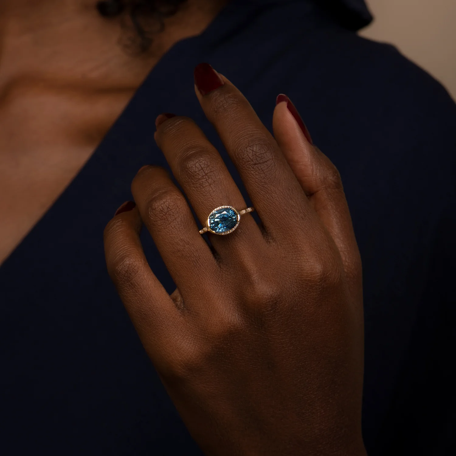 Oval Sapphire Engagement Ring with a Brilliant Diamond Belt - Image 2