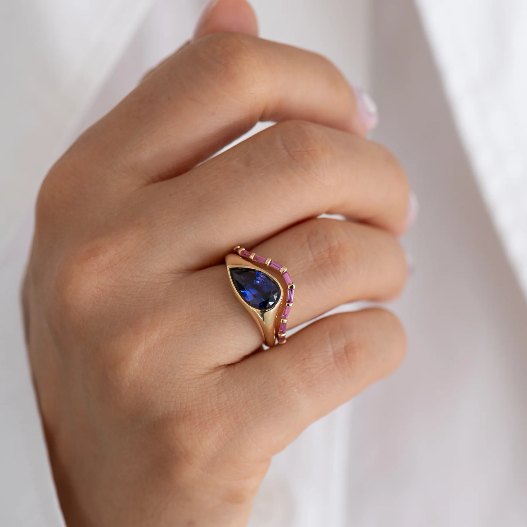 Pear Shape Sapphire Solitaire Ring in Violet Purple - Image 4