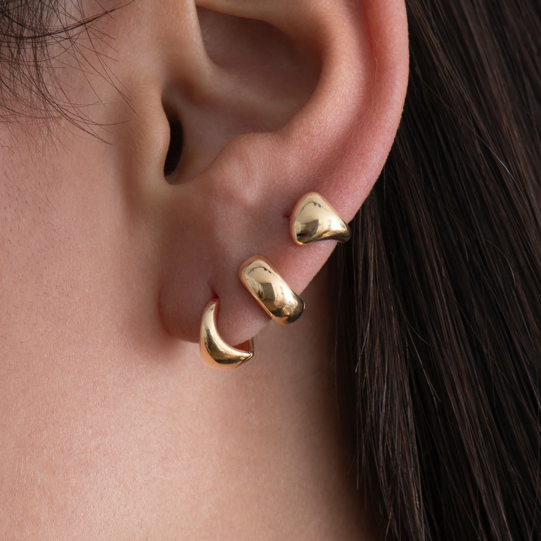 Puffy Solid Gold Huggie Earrings - Image 11