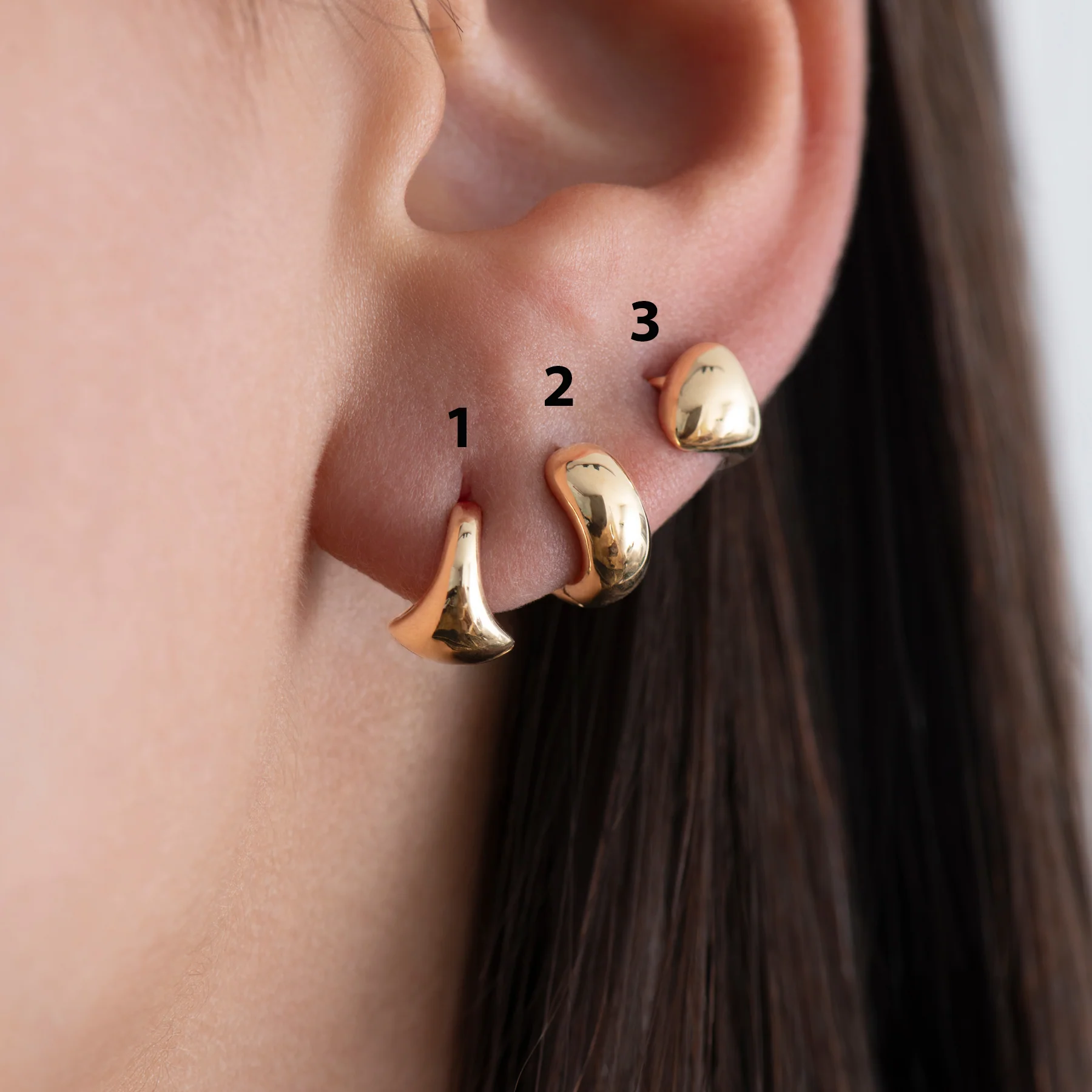 Puffy Solid Gold Huggie Earrings - Image 2