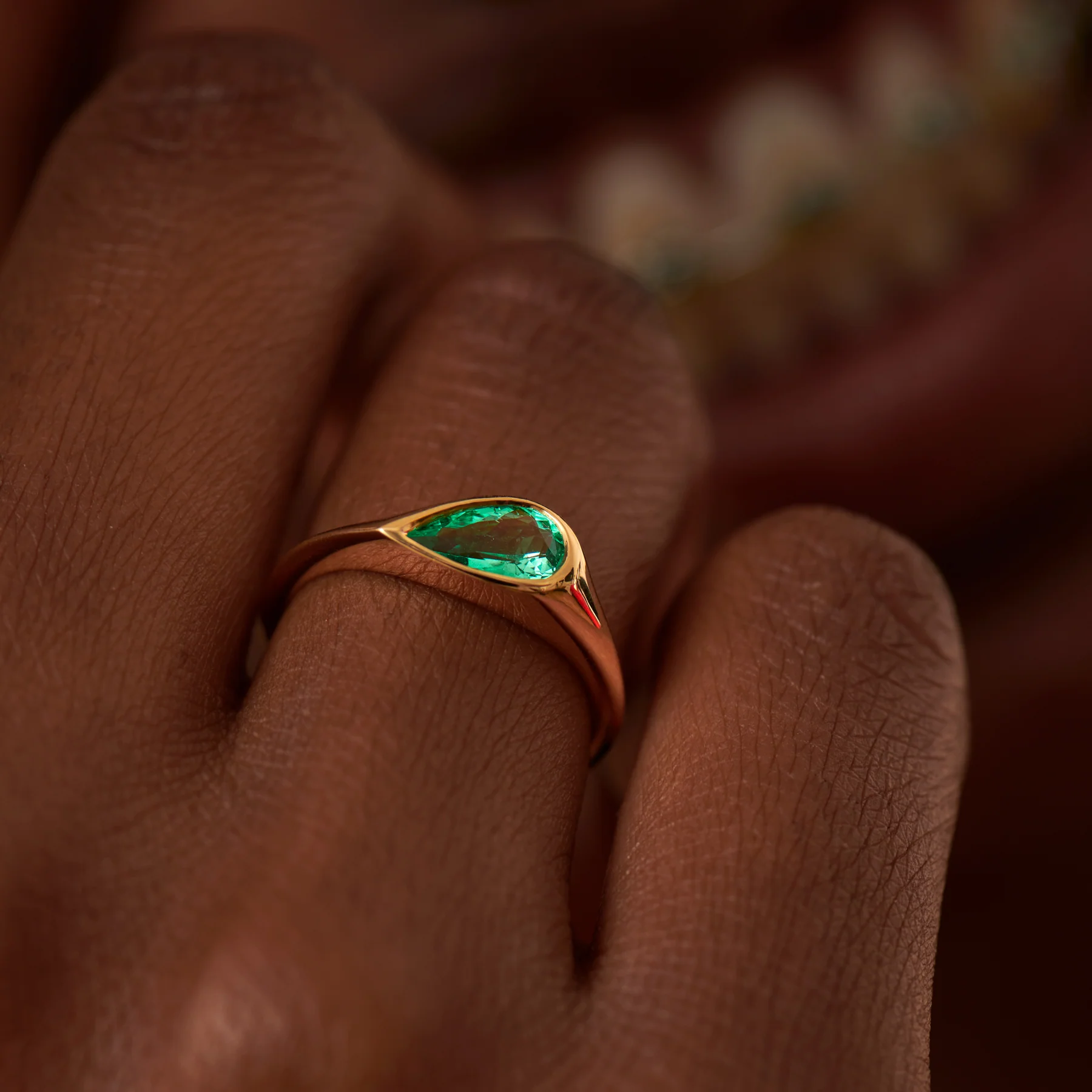 Solitaire Engagement Ring with a Pear Cut Emerald - Image 3