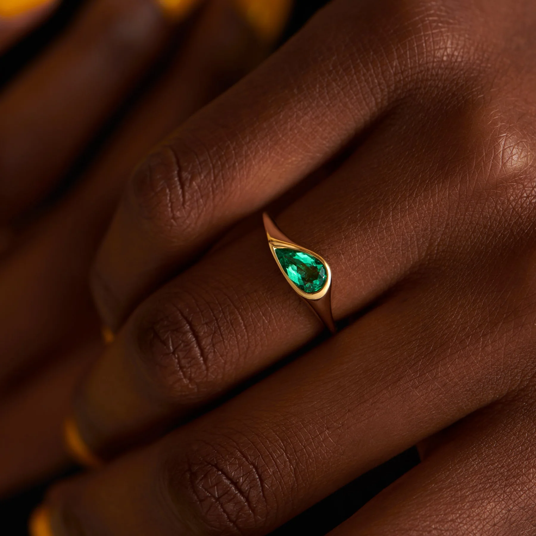 Solitaire Engagement Ring with a Pear Cut Emerald - Image 5