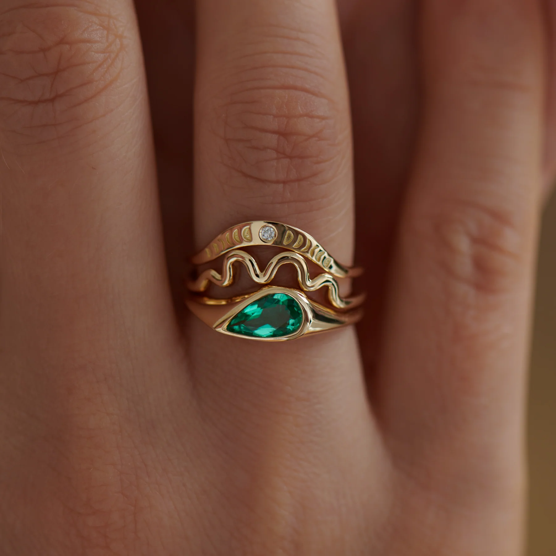 Solitaire Engagement Ring with a Pear Cut Emerald - Image 6